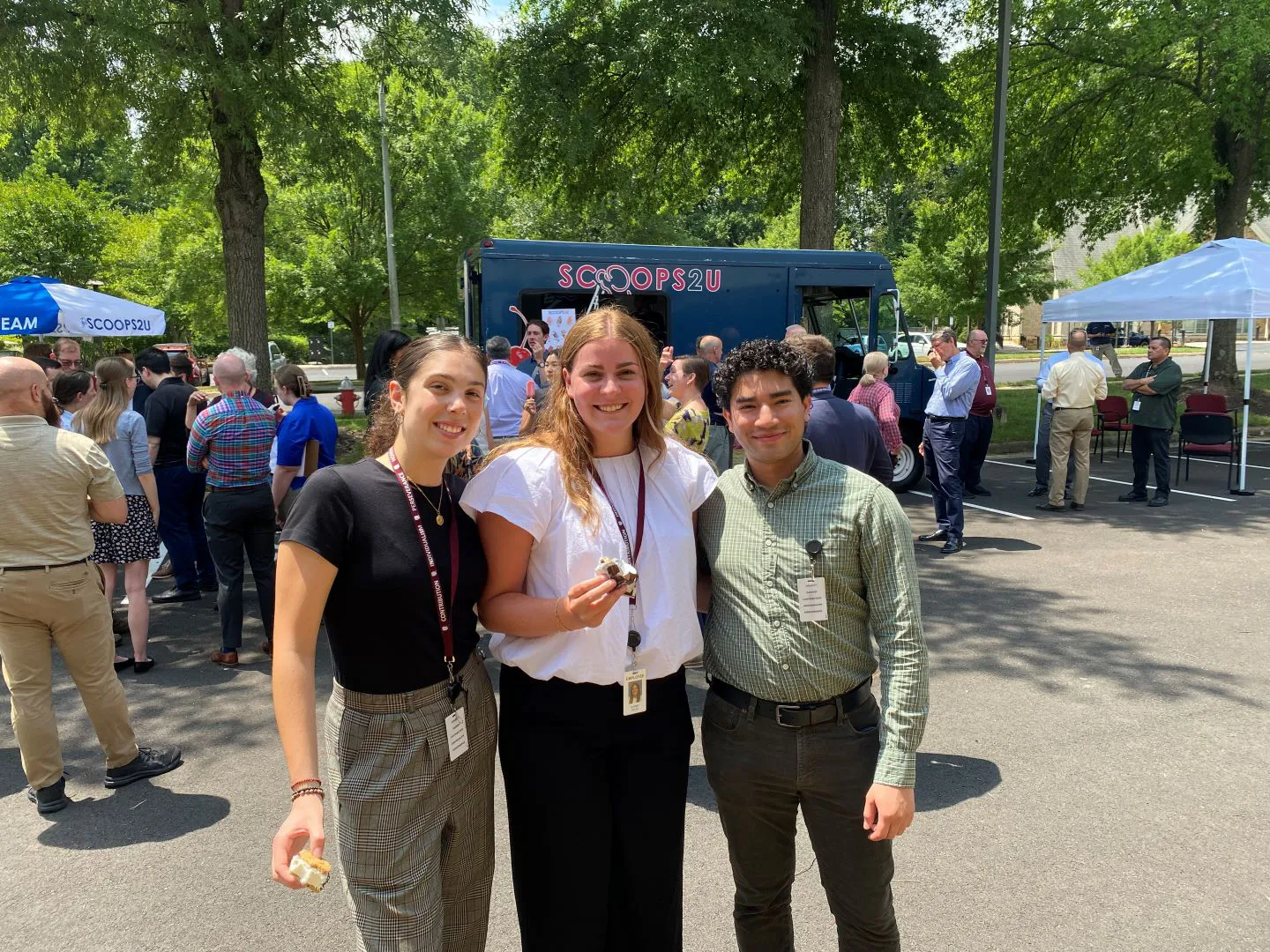 MaryGrace Gozzi (left) and Victor Madrid (right) enjoy the Fairfax, Virginia, office's summer ice cream social.