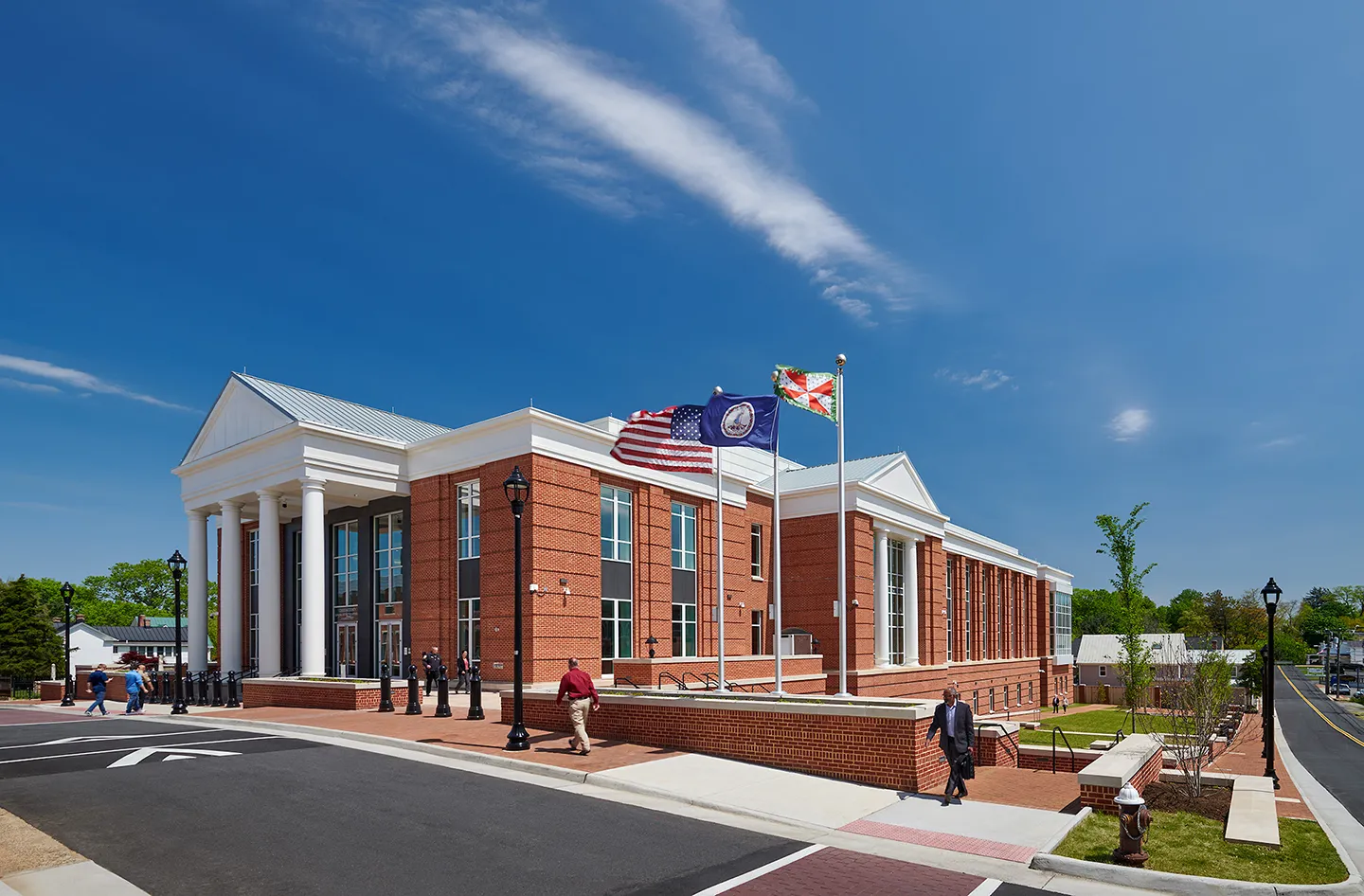 The project included design and construction of a new district courts building, renovation to two existing historic courts buildings, and the design and construction of a structured parking garage.