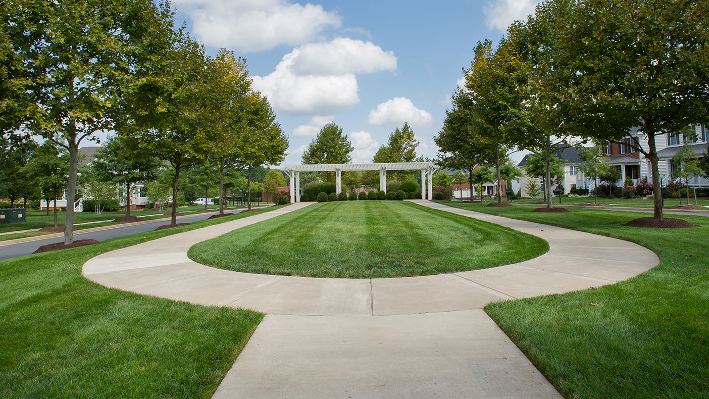 The large-scale community project includes a shopping center, four public schools, daycare, library, churches, two golf courses, and recreation center.