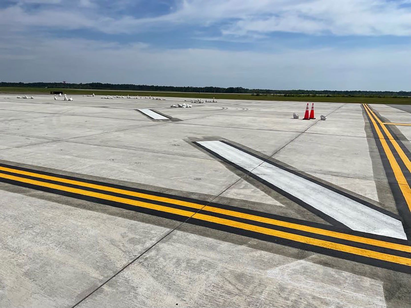 We designed the replacement of two 200 by 200 foot of 14-inch-thick high-temperature concrete vertical take-off and landing pads at the Marine Corps Air Station Cherry Point as the client transitioned aircraft from the AV8-B Harrier to the F35-B.